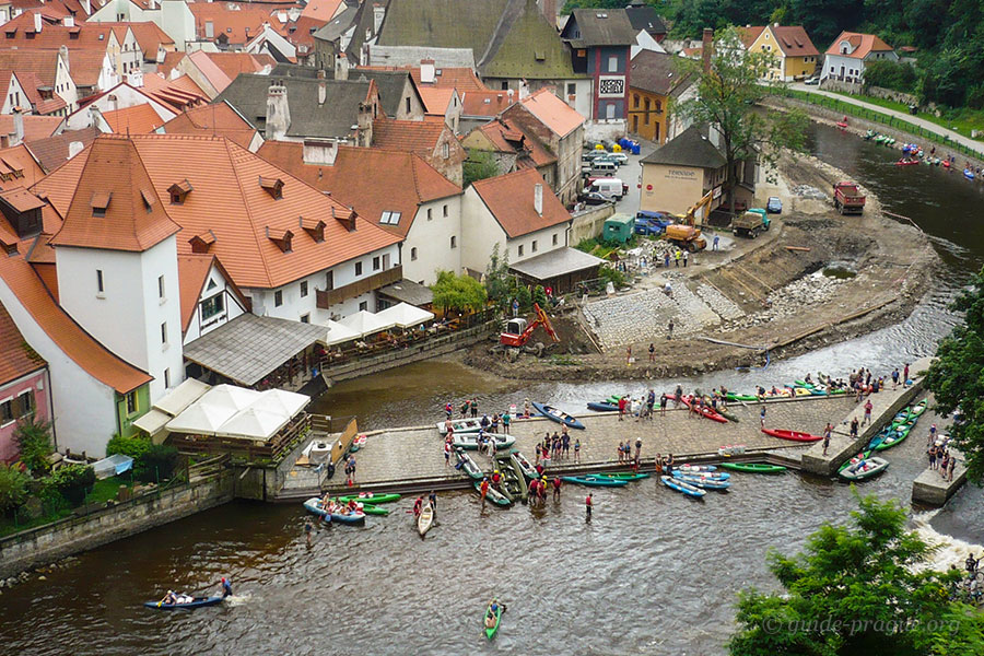 Photo of rafts and canoes on the Vltava River in Cesky Krumlov.