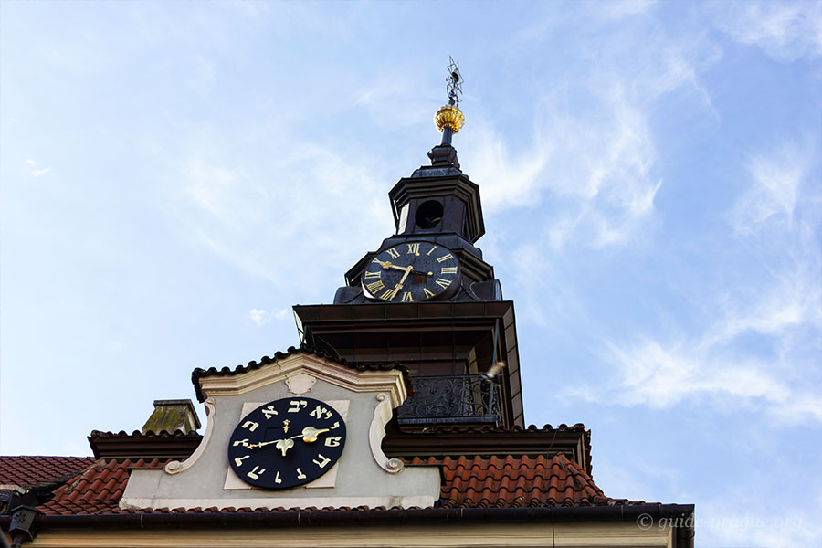 Photo of the clock on the building of Town Hall in the Jewish Quarter, Prague